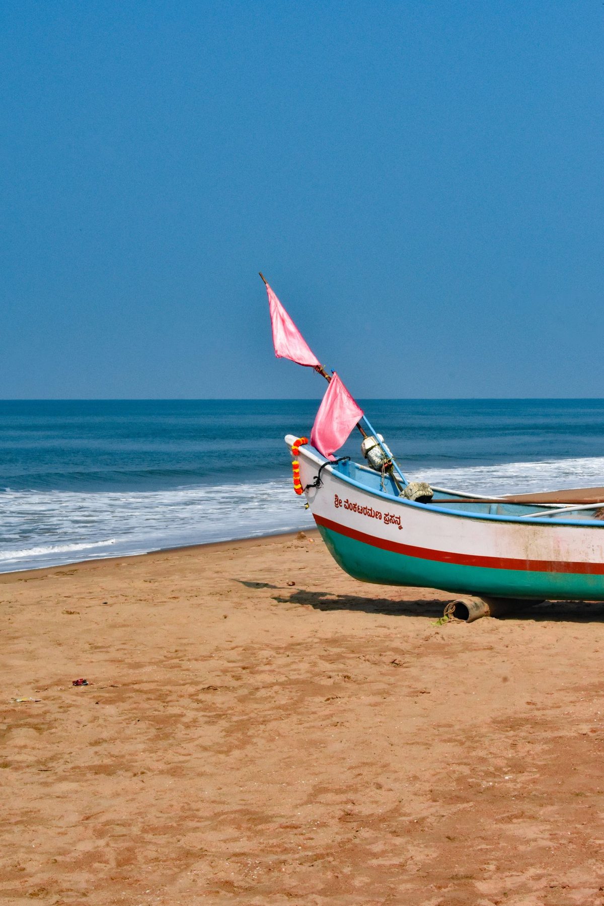 Colourful fishing boat on Gokarna beach